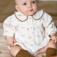 baby takara ruffled collar onesie