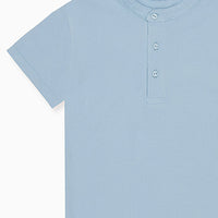 alcon polo shirt