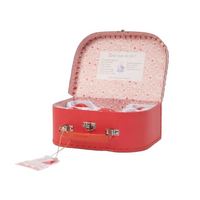 red ceramic tea set