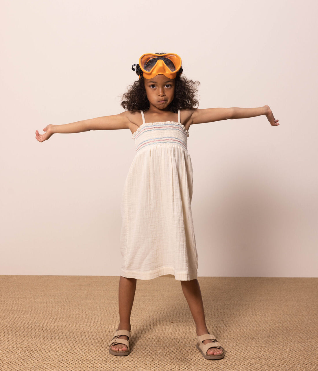 sleeveless smocked dress