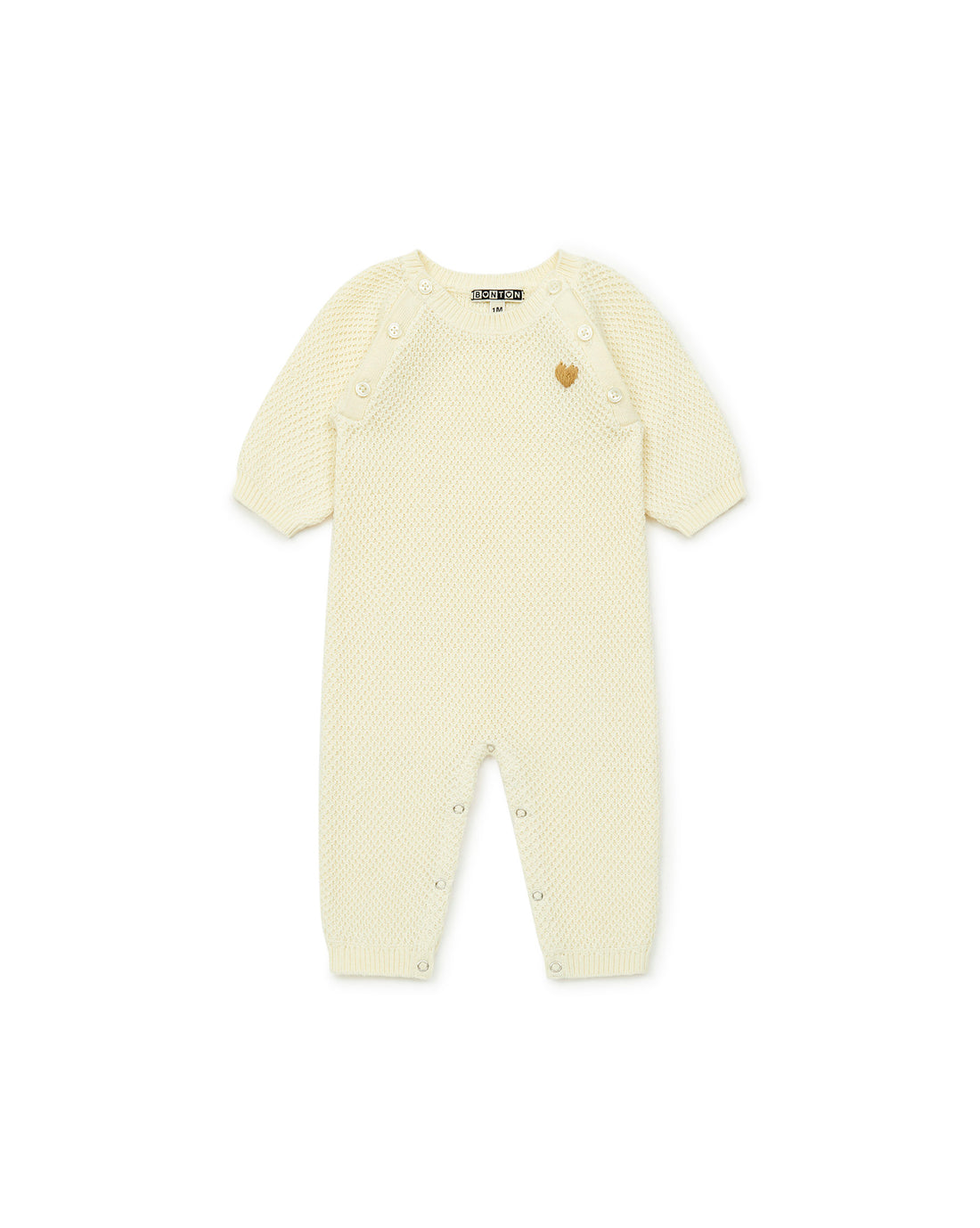 baby onesie creme