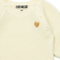 baby onesie creme